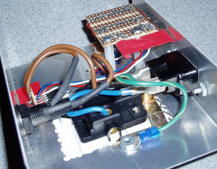 Small veroboard, mains connectors, fuseholder, triac bolted to case